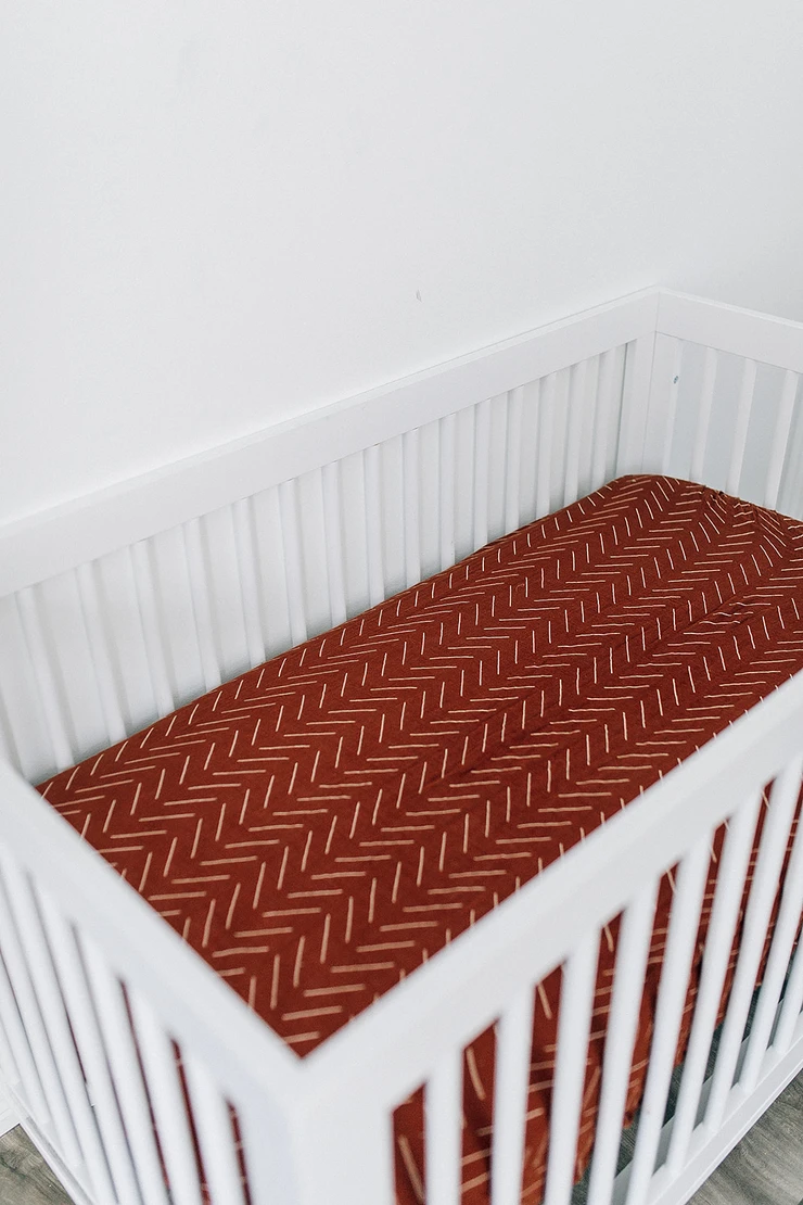 Rust mudcloth crib deals sheet